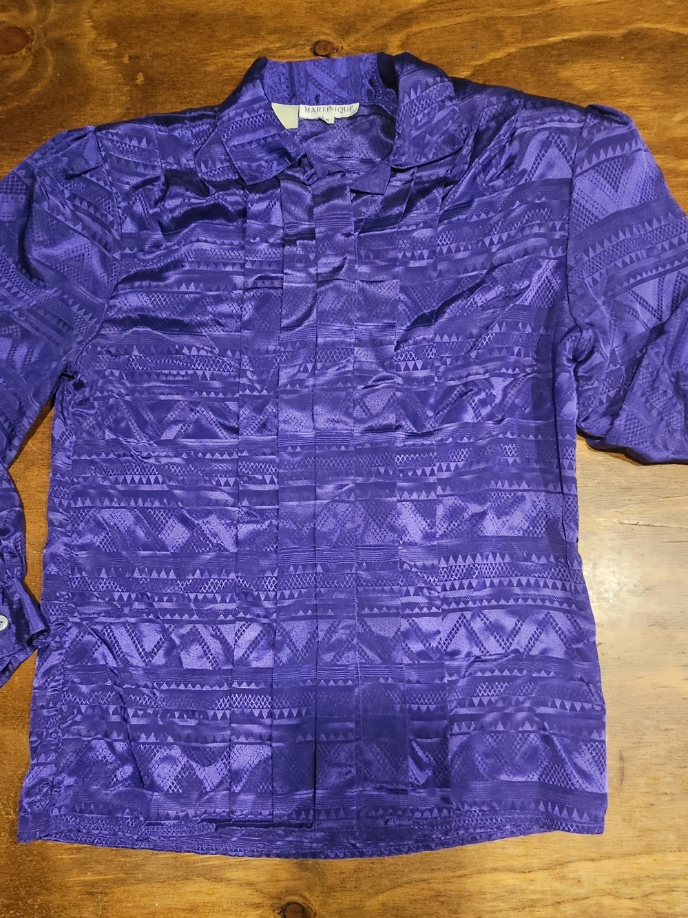 C3, The product is a women's shirt in size 6, made by the brand Martinique.